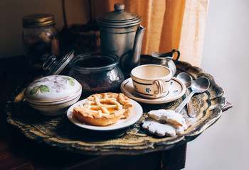 Morning coffee with vintage kitchen props and homemade cookies