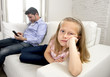 internet addict father using mobile phone ignoring little sad daughter bored lonely and depressed