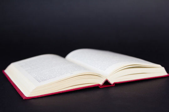 Old openrd book on black color background