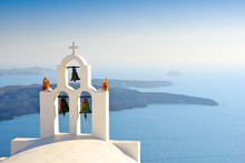 Unique Bell Tower On Santorini Island, Greece. The View Toward Caldera Sea Waiting For Sunset.