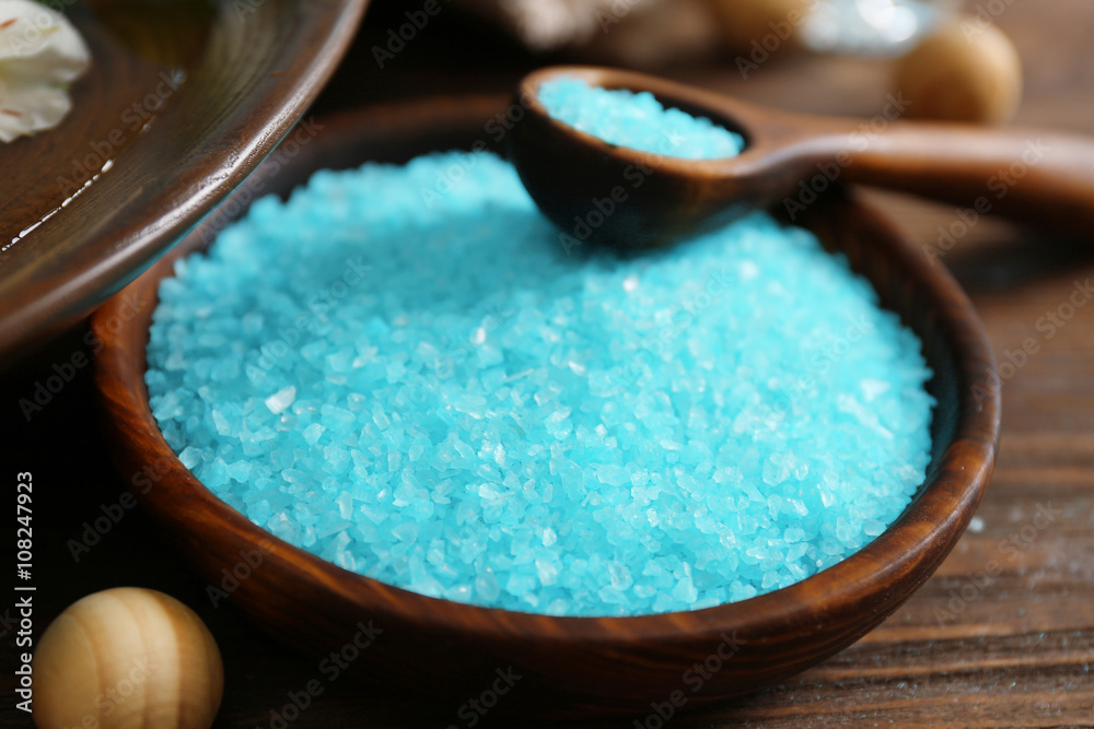 Spa concept. Bowl with blue sea salt, close up.