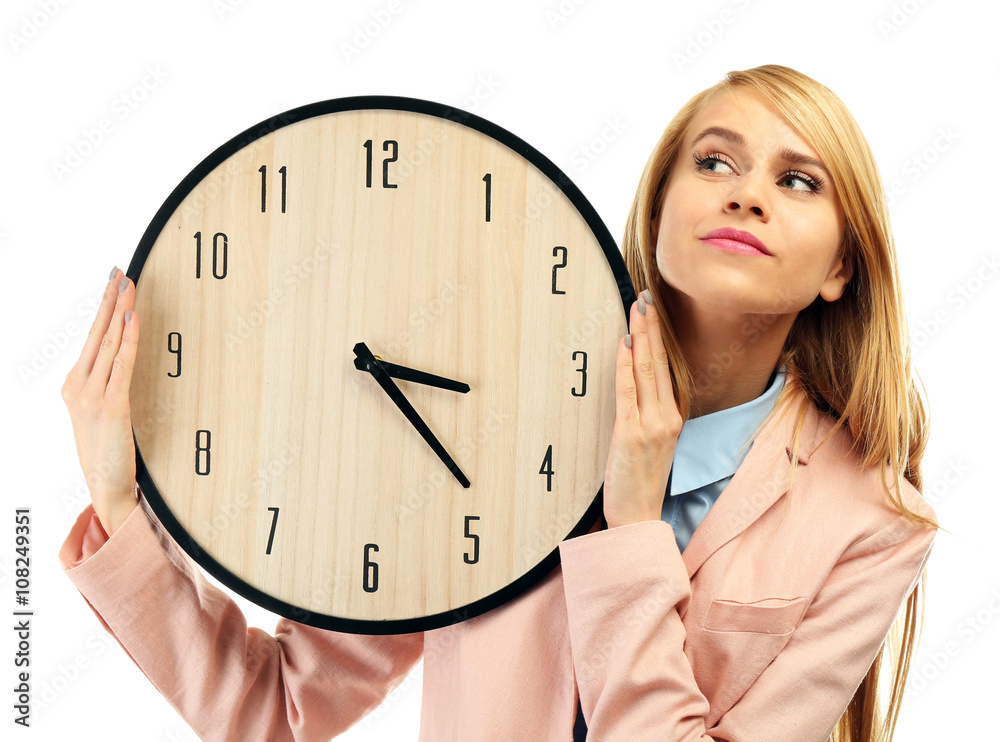 Young attractive woman holds a  clock, isolated on white