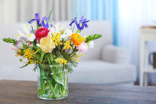 A Bouquet Of Fresh Flowers In A Glass Vase.