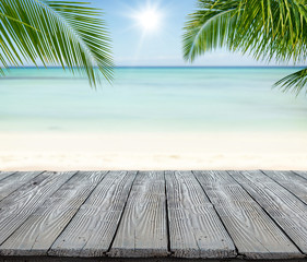 Wall Mural - Empty wooden planks with blur beach on background