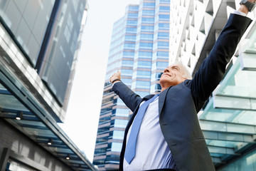 Portrait of confident businessman outdoors