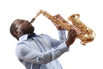 African American jazz musician playing the saxophone, isolated on white