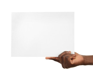 Wall Mural - Male hands holding sheet of paper isolated on white