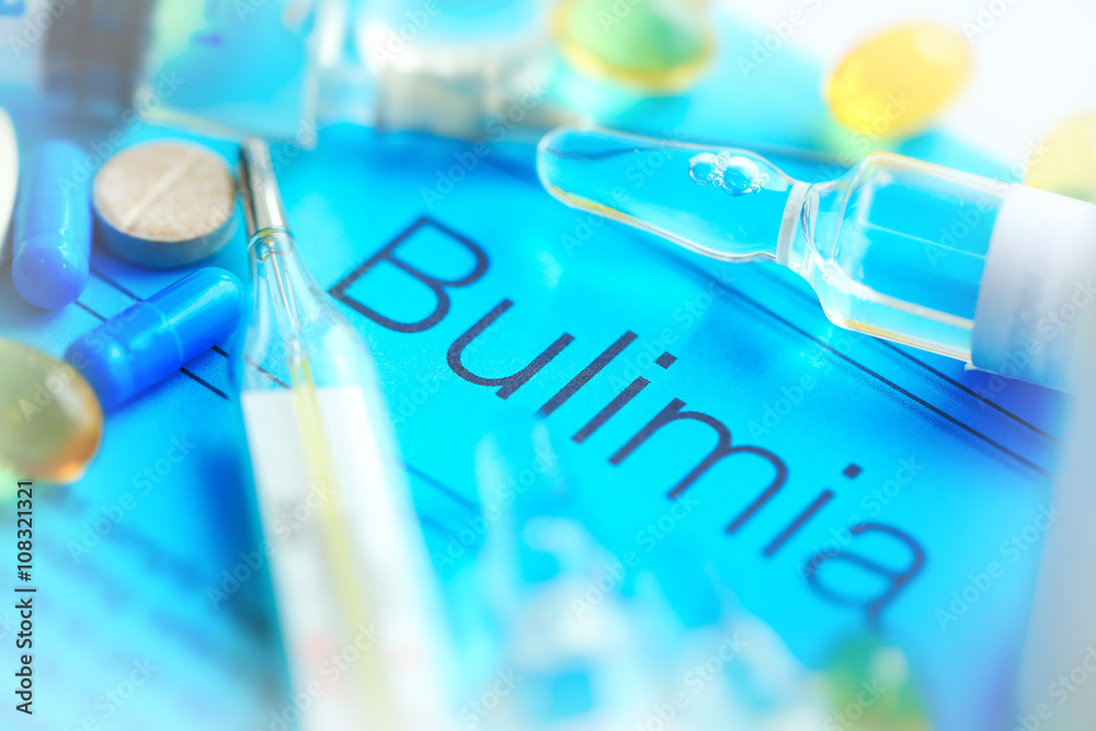 Medicines and Bulimia diagnosis written on paper closeup