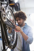 Worker Repairing Bicycles