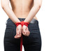 © Jenov Jenovallen - submissive topless asia woman wearing a jeans in red color rope on isolate white background