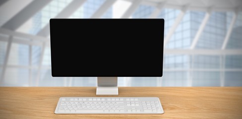Poster - composite image of a computer over a desk