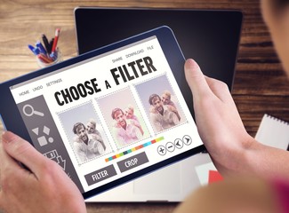 Poster - Composite image of woman using tablet pc