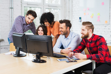 Canvas Print - Group of business people working together in office on desktop c