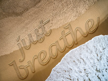 Just Breathe Written On The Beach