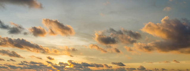 Wall Mural - sunset behind the cloud and orange sky
