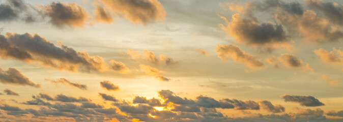 Wall Mural - sunset behind the cloud and orange sky