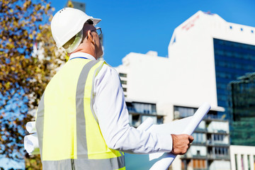 Engineer builder at construction site