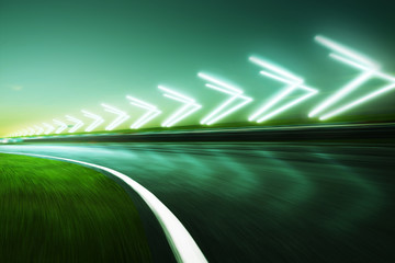 Wall Mural - Motion blurred racetrack,night scene cold mood. with arrow light Effects..