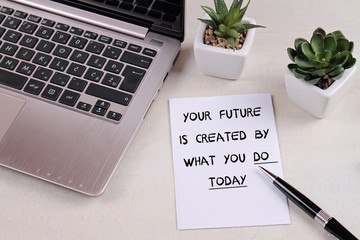 Wall Mural - Inspiration motivation quotation your future is created by what you do today on work desk. Success, Self development concept