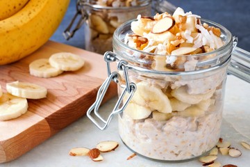 Wall Mural - healthy overnight oats with bananas and nuts in glass canning jars