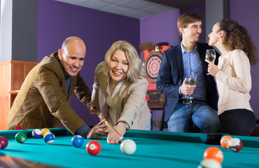 Adults people having pool game