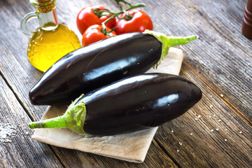 Sticker - Eggplant on vintage wooden background