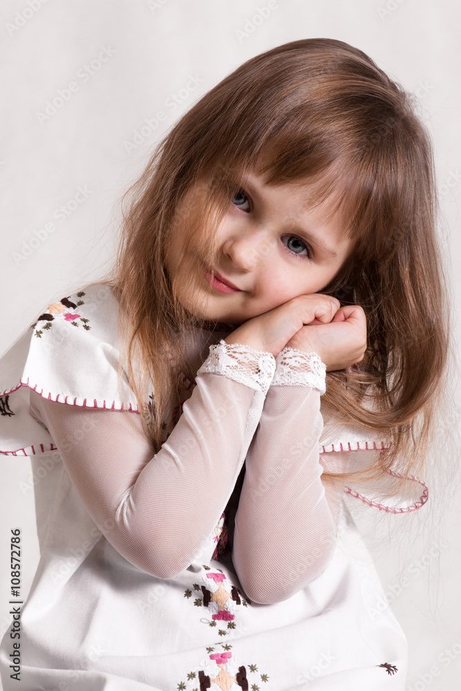 Very lovely,cute,adorable girl.Beautiful,attractive,nice little girl.Cute kid.Really beautiful,pretty little girl.Little Princess.Little girl looks interesting,shy.Portrait of fashionable little girl