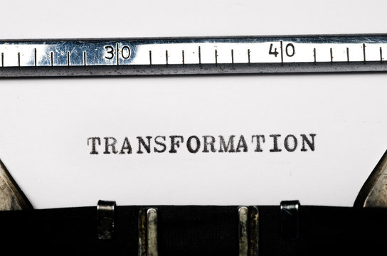 word transformation typed on typewriter