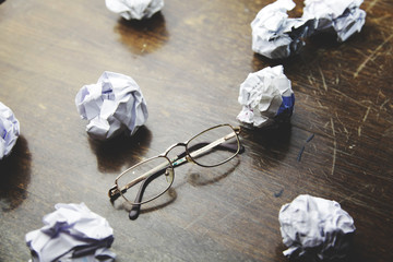 Wall Mural - crumpled  paper and glasses