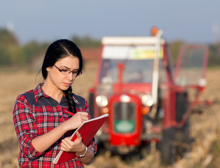 Wall Mural - Farmer woman on field