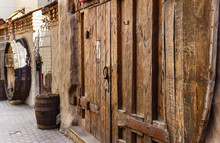Old Wooden Door, The Entrance To A Restaurant In The Heart Of The Old Town