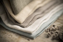Closeup Of A Pile Of Folded Dull-Colored Fabric