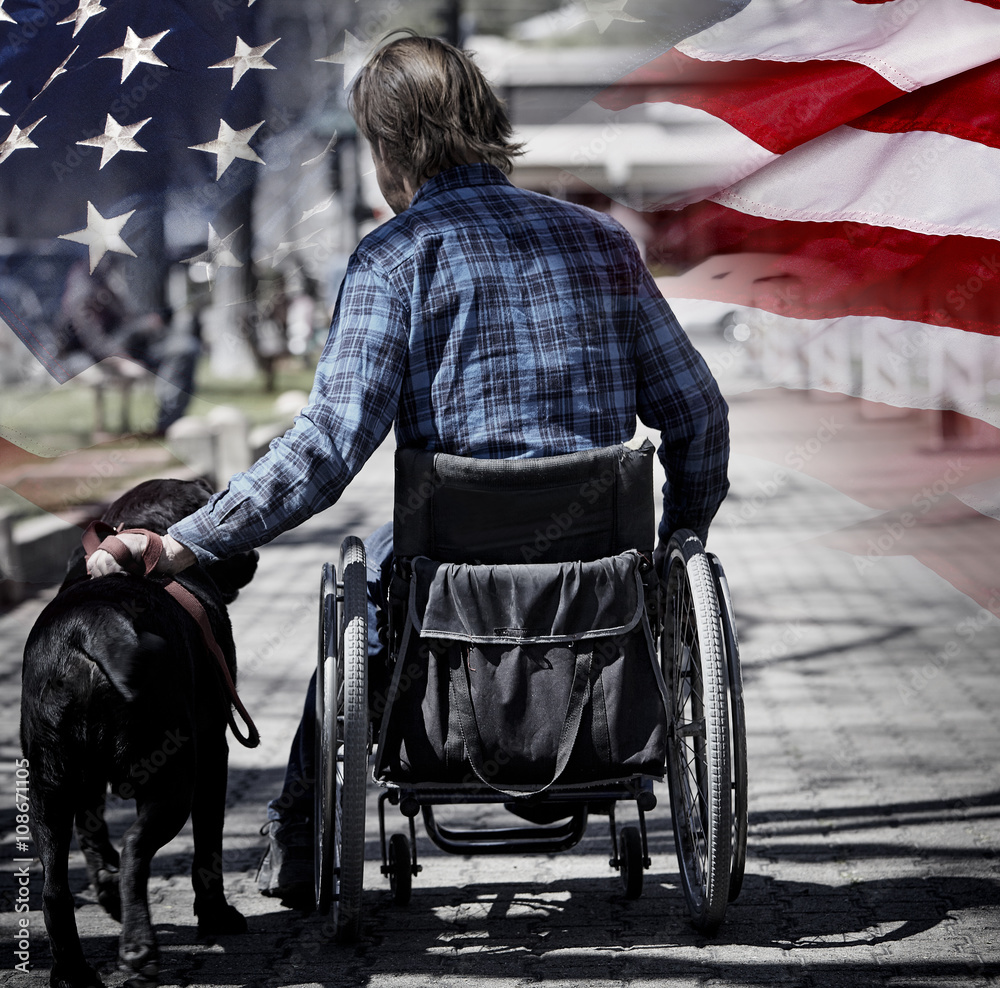 Man on wheelchair with dog concept USA veteran patriotism - obrazy, fototapety, plakaty 