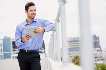 Poster - Businessman using digital tablet