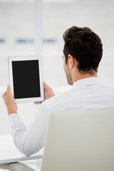 Poster - Businessman using digital tablet