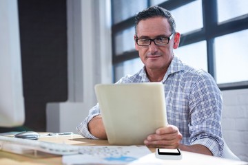 Poster - Happy man using digital tablet