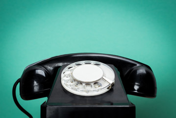 Poster - Retro telephone on wood table for old style background