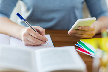 Sticker - close up of student with smartphone and notebook