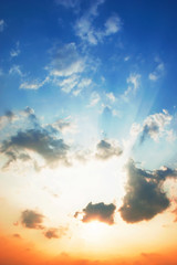 Wall Mural - Skies are changing from blue to orange in the sunset.