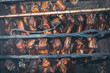 © yavyav - Smoked sausuages and meet in smokehouse