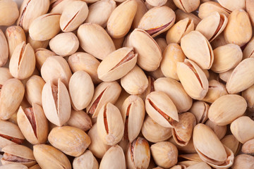 Pistachio nuts as a background close up macro