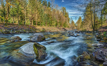 A River Runs Through The Cascade Mountains Just Outside Of Seattle, Wa On An Early Spring Day