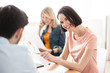 © Yakobchuk Olena - Pretty creative team is working in office