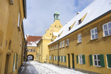 Fototapeta  - Small street in the Fuggerei district in Augsburg, Germany