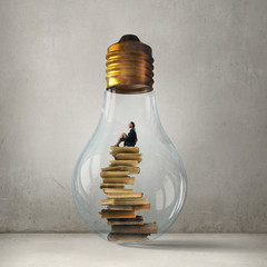Wall Mural - woman in electric bulb