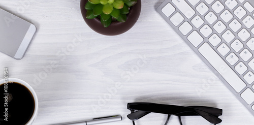 Fotografie, Obraz Office work objects and coffee on clean white desktop background