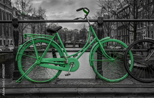 Fototapeta na wymiar Green bike black and white background