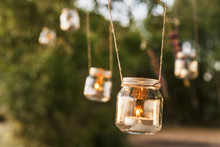 Mason Jar Candle Hanging On Tree For Wedding Decor