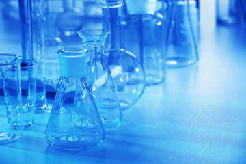 Wall Mural - laboratory glassware on table closeup