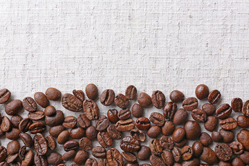 Poster - Frame of coffee beans on color sackcloth background